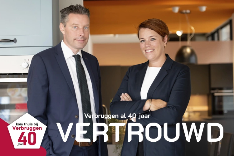 Afbeelding van eigenaar en eigenaresse Verbruggen, met de tekst: Verbruggen al 40 jaar vertrouwd.